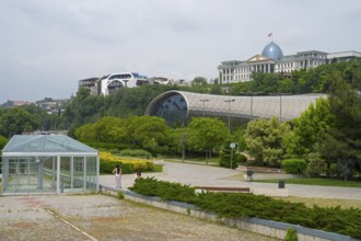 Glass-covered architecture in a park with green spaces, Rike Music Theatre and Exhibition Center,