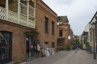 Historic brick buildings and shops along a quiet street, Old Town, Tbilisi, Tbilisi, Georgia