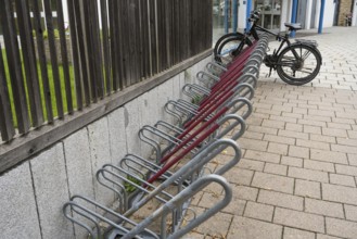 Several bike racks next to each other, bikes on bike racks, Bavaria, Germany