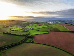 Colours of autumn Fields and Farms over Sheldon from a drone, Torbay, Devon, England, United