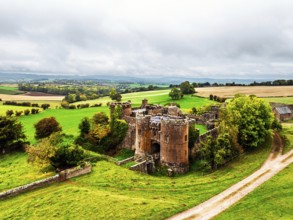 Autumn Colours over ruins of Pembridge Castle or Newland Castle from a drone, Herefordshire,