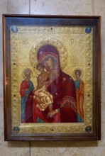 Icon of the Mother of God and Child, set in an ornately decorated golden frame, Sameba Cathedral,