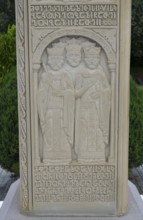 Stone relief with images of kings and ancient inscriptions, on the grounds of Sameba Cathedral,