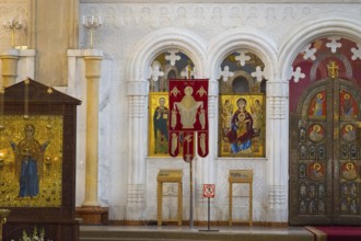 An artfully decorated interior with religious icons and decorated wall, Sameba Cathedral, Trinity