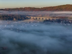 Autobahn bridge, A 95, village, houses, morning light, fog, mountains, autumn, sunny, aerial view,