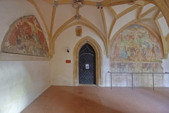 Gothic cloister with historic wall painting of the monastery church, Benedictine monastery built