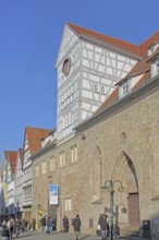 Hospital courtyard built 13th century with half-timbered buildings, pedestrian, market square,
