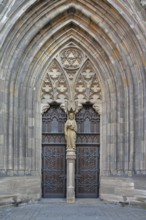 Church portal of the Gothic St. Mary's Church, tympanum with figure and decorations, Reutlingen,