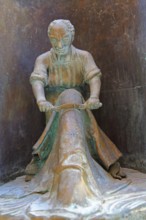 Tanner working with leather at Bonifatius Stirnberg's guild fountain 1983, modern art, bronze