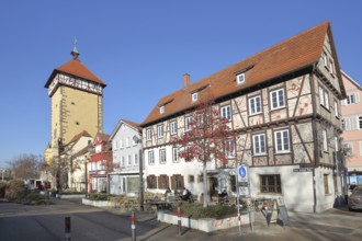 Historic Tübingen Gate built in 1330 and half-timbered house with street shop, city gate, city