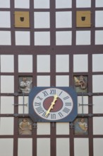 Historic Tübingen Gate built in 1330 with half-timbering, clock and figures, city gate, city tower,