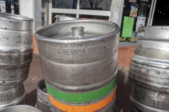 Arvada, Colorado - Empty beer kegs stacked outside Cheapskates sports bar in Olde Town Arvada