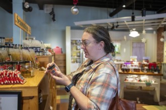 Arvada, Colorado - A woman shops for spices at the Penzeys Spices store in Olde Town Arvada