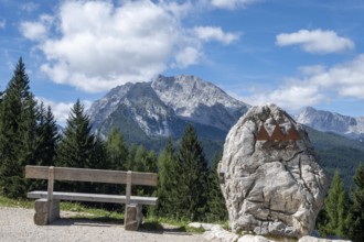 Bench and symbol of the Berchtesgaden National Park on its border, with the Watzmann in the
