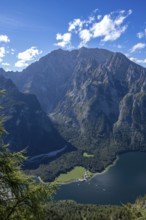 Deep view from Feuerpalfen of Lake Königssee with St. Bartholomä and some ships as well as the