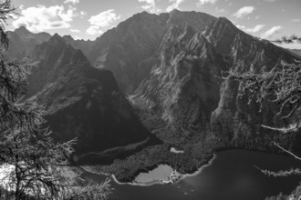 Deep view from Feuerpalfen of Lake Königssee with St. Bartholomä and some ships as well as the
