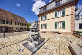 Buildings, town hall, residential and commercial buildings, benches, stacked stones, barrier