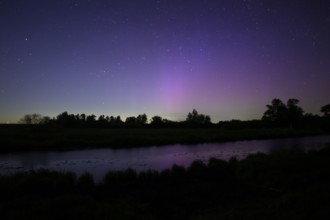 Aurora borealis aurora borealis on the Hunte dyke, Dümmerniederung nature park Park, Lower Saxony,