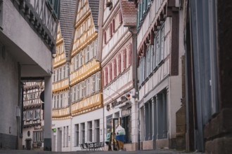 Narrow street with numerous half-timbered houses in the old town, Herrenberg, Böblingen district,