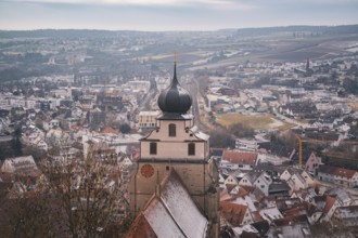Overview of the town with a distinctive church tower and snowy surroundings, Herrenberg, Böblingen
