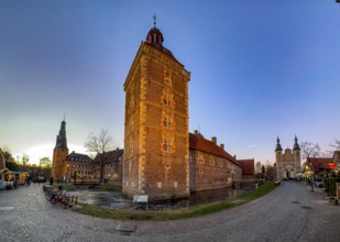 Panoramic photo in winter on winter evening from left on the edge of the picture Raesfeld Castle in