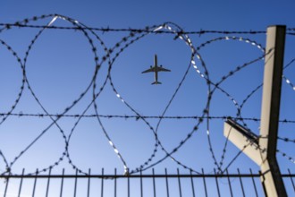 Symbolic picture security at the airport, outer fence at Düsseldorf International Airport, steel