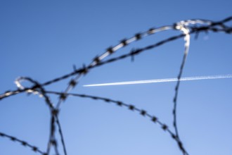 Symbolic picture security at the airport, outer fence at Düsseldorf International Airport, steel