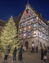 The historic Pilate House with the annual advent calendar, in evening lighting, Am Tiergärtnertor,