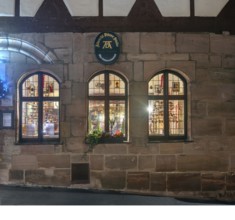 View through the windows of the historic restaurant, Albercht Dürer Stuben, in the old town with