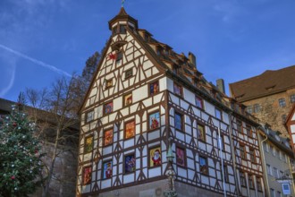 Historic Pilate House with Advent Calendar in the Evening Sun, Beim Tiergärtnertor, Nuremberg,