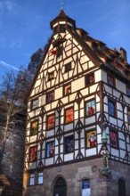 Historic Pilate House with Advent Calendar in the Evening Sun, Beim Tiergärtnertor, Nuremberg,