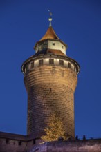 Sinwell tower illuminated in the evening, built in the 13th century, Kaiserburg, Nuremberg, Middle