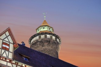 Sinwell Tower built in the 13th century, on the Nuremberg Kaiserburg in the evening lighting,
