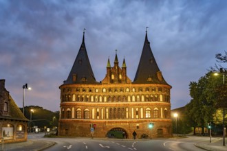 The Holsten Gate at dusk, Lübeck, Schleswig-Holstein, Germany