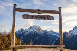 Snow-covered Watzmann through a wooden frame with the inscription Lieblingsplatzerl, Hirscheck,