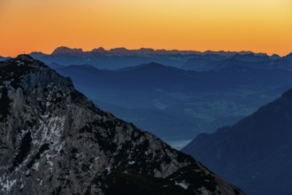 Dawn in the mountains, view of silhouette of mountain ranges, in front Hochstaufen, Zwiesel, Bad