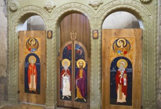 Decorated church doors with icons and ornate wood carvings, Svetitskhoveli Cathedral,