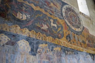 Wall painting with mythological themes, including ships and a lion in medieval style,