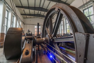 Large steel wheel of a steam engine in the coal world, Steinkohlebergbau Sachsen Museum, Oelsnitz