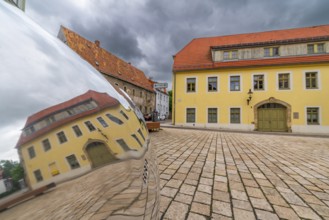 Sculpture, art installation Trashstone 689 in the form of a silver nugget by artist Wilhelm Mundt,