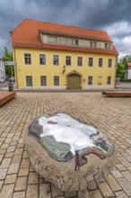 Sculpture, art installation Trashstone 689 in the form of a silver nugget by artist Wilhelm Mundt,