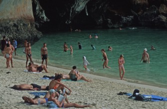 People bathing and sunbathing on Pranang Cave beach, two years in front of the tsunami, Krabi,