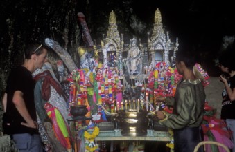 Shrine with wooden phalls on Pranang Cave beach, two years in front of the tsunami, Krabi,