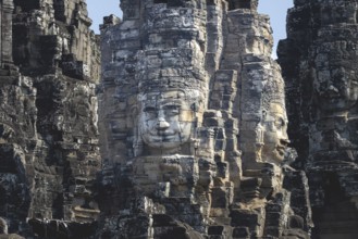 Huge stone-carved faces of Bodhisattva Lokeshvara, also Avalokiteshvara, Bayon Temple, Angkor Thom,