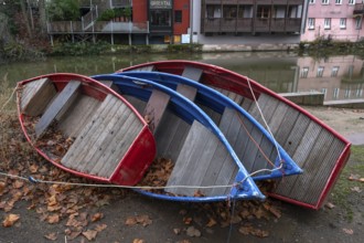 Assembled rowing boats on the banks of Pegnitz, river in Nuremberg, Middle Franconia, Bavaria,