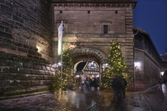 Decorated entrance to the Handwerkerhof during Advent, Königstor, Nuremberg, Middle Franconia,