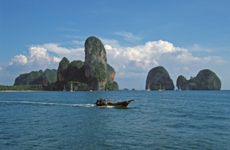 Longtail boat, rocks in the sea, Railay East, two years in front of the tsunami, Krabi, Thailand,