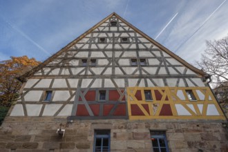 Color test on the façade in front of the renovation of a historic half-timbered house, Fürth,