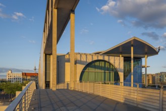 Footbridge with Marie-Elisabeth Lüders House in the evening light on the Spree in the government