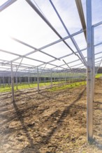 Metal framework for solar system installation shows solar radiation, energy revolution,